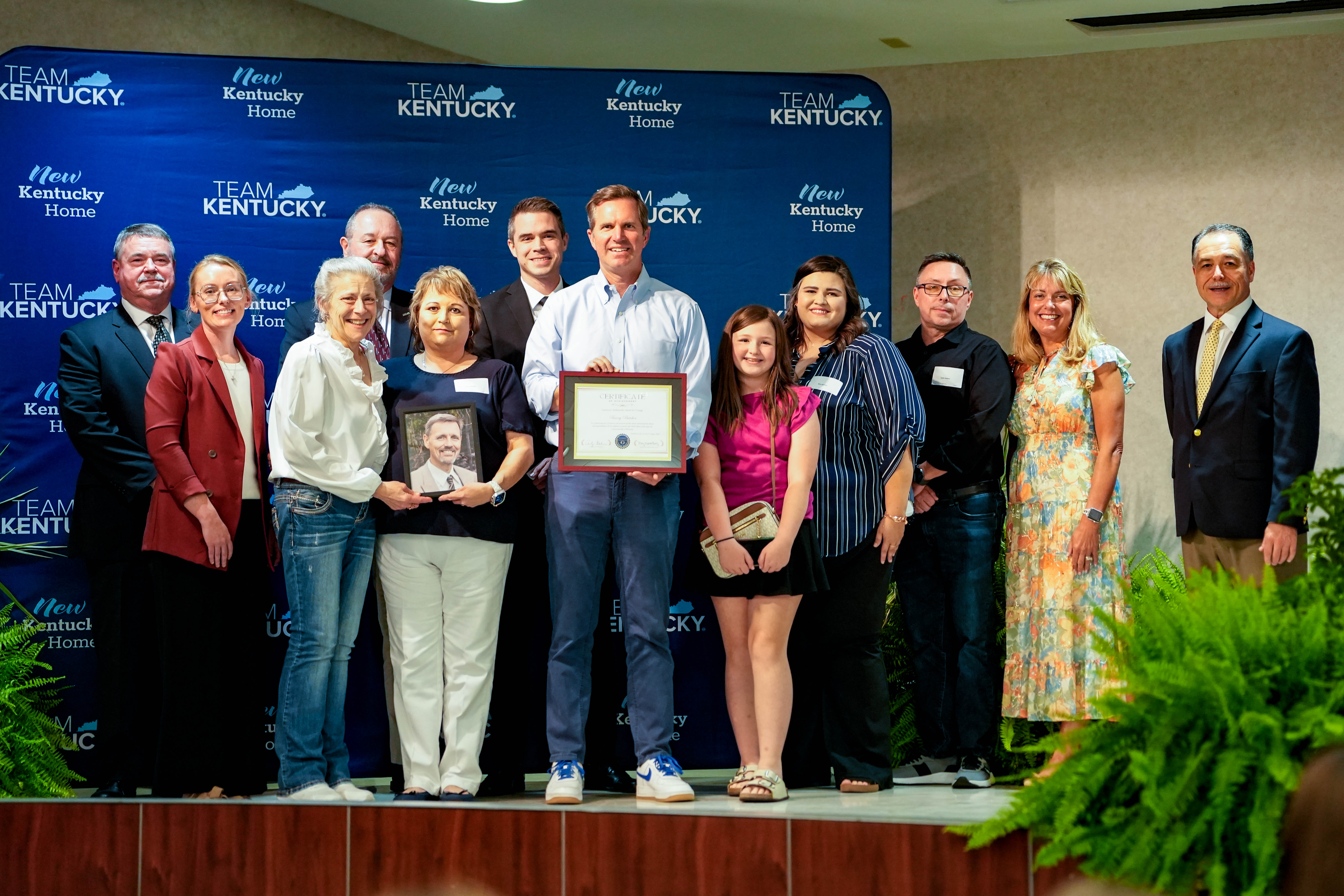The family of Barry Butcher receiving the 2026 Governor's Ambassador Award for Courage