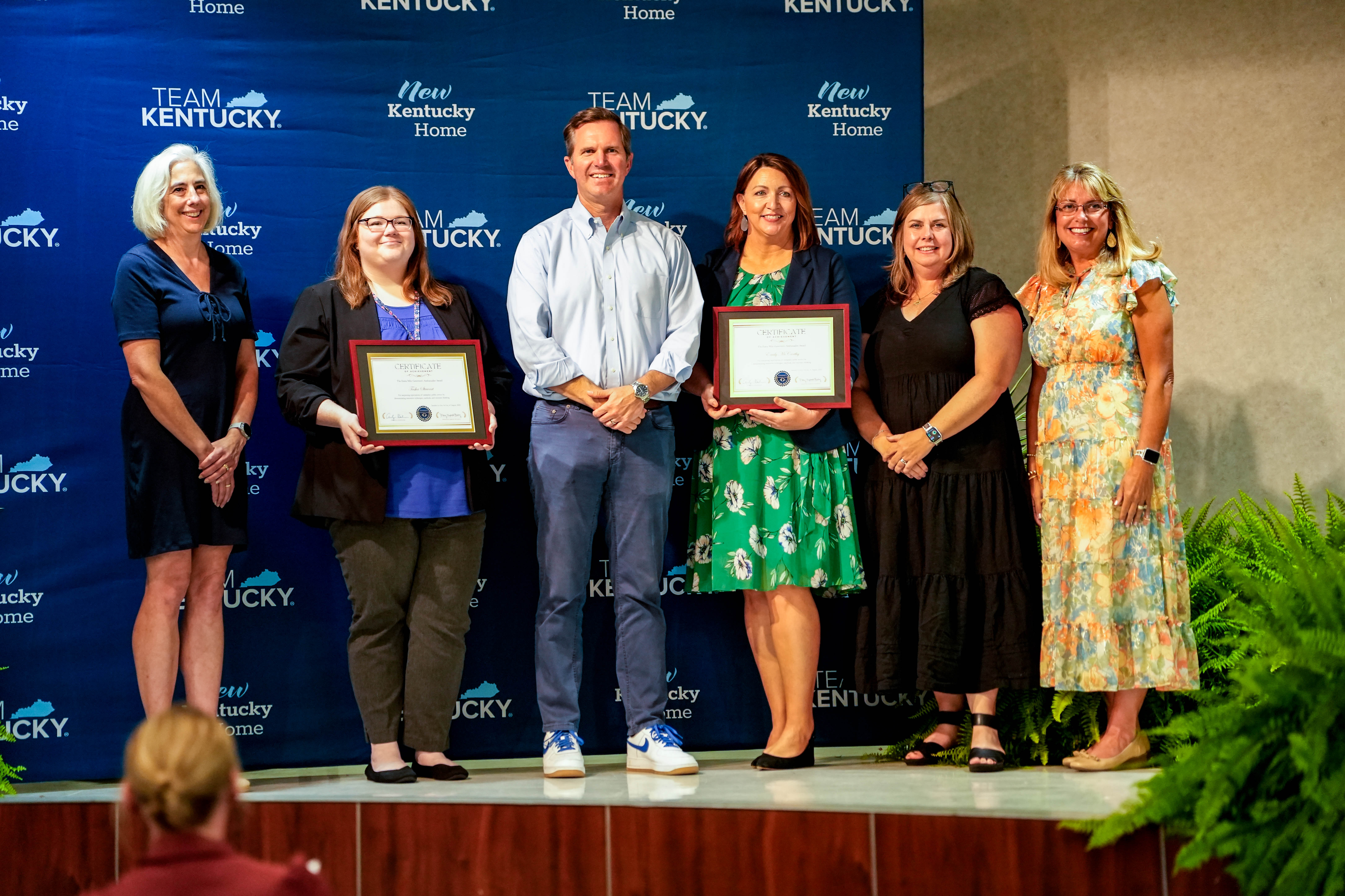 Emily McCarthy and Tasha Stewart accepting the 2026 Extra Mile Award