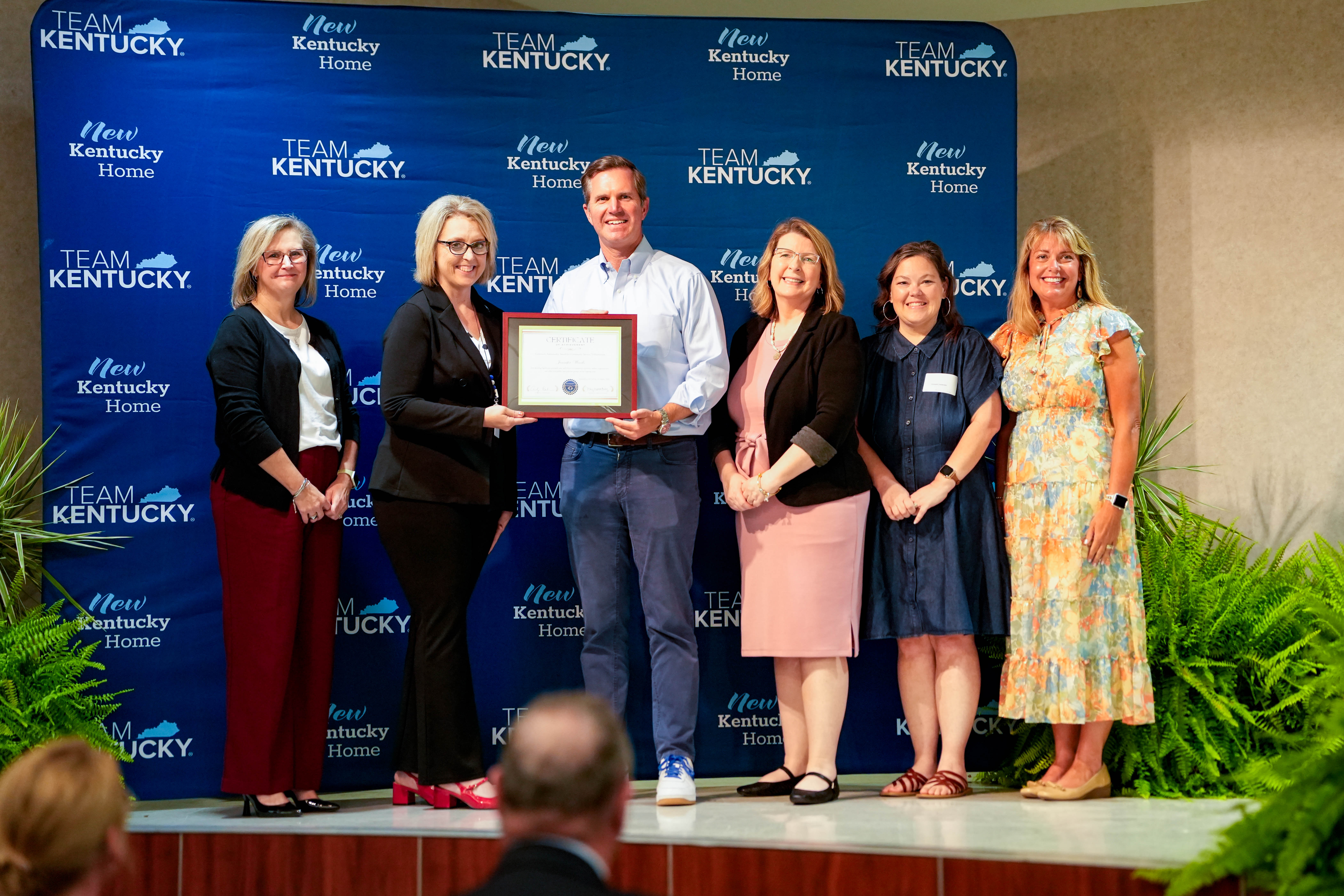 Jennifer Woods receiving the 2026 Governor's Ambassador Award for Community Service and Volunteerism