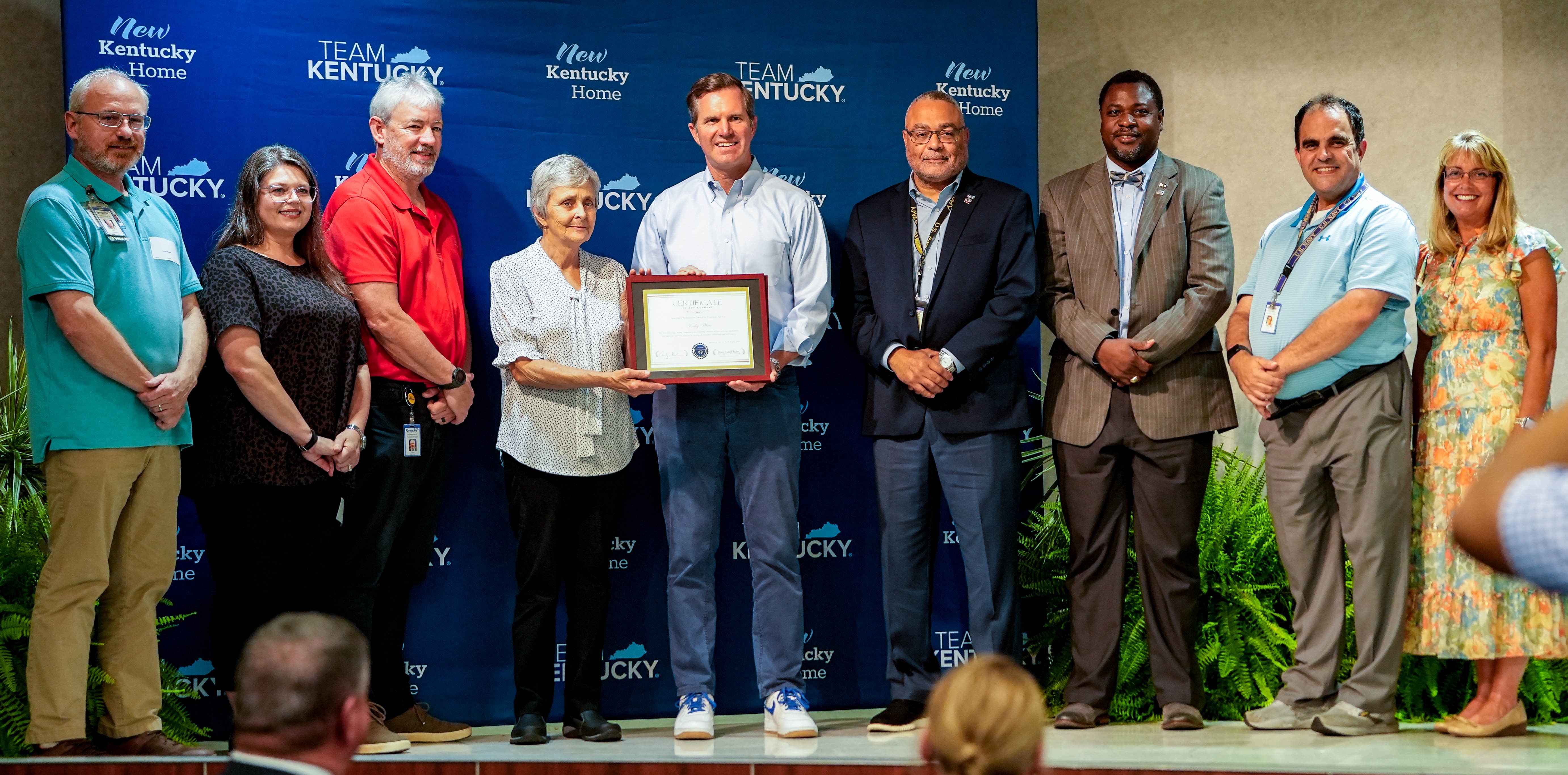 Kathy White receiving the 2026 Governor's Ambassador Award for Customer Service