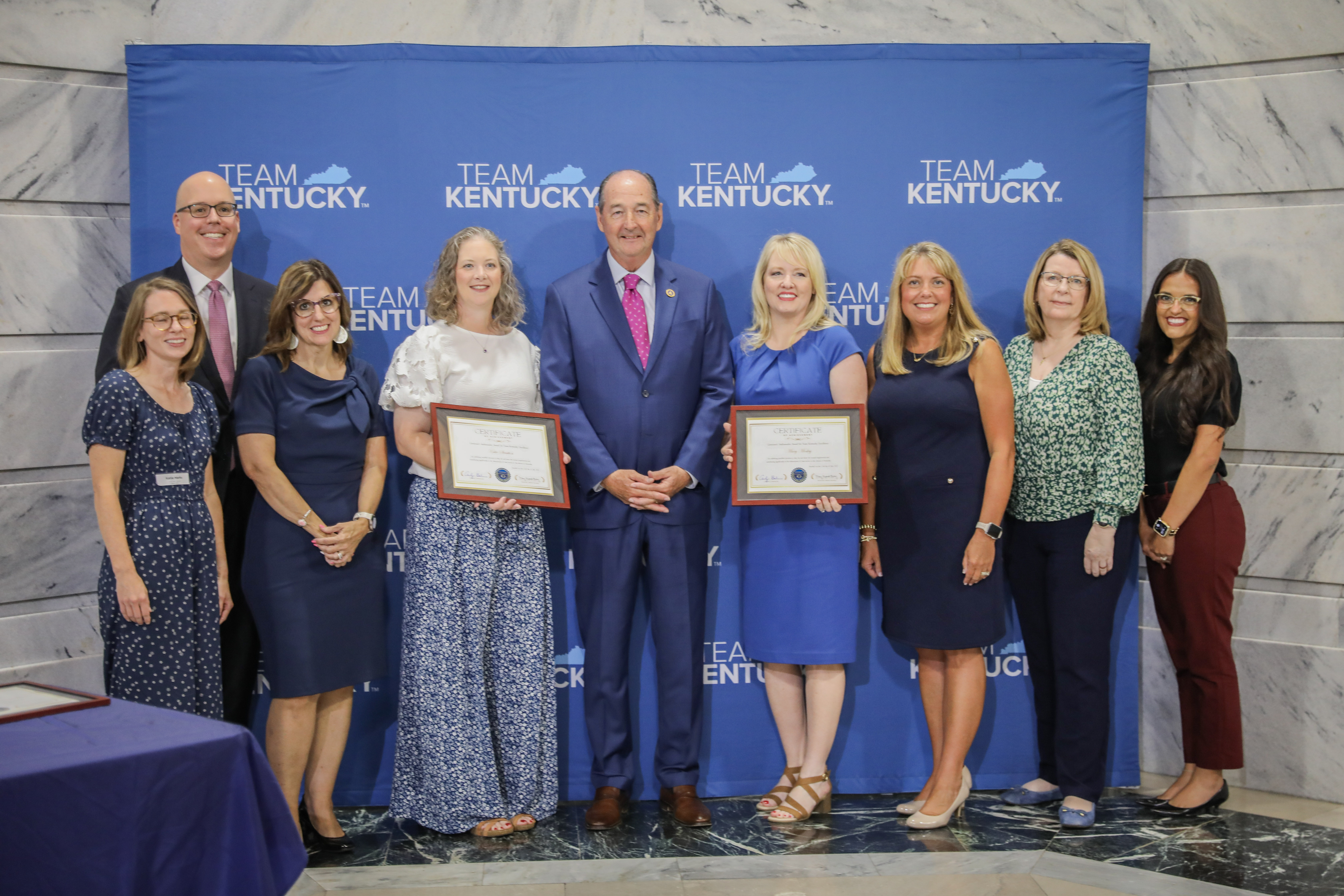 Wesley Turner, Energy and Environment Cabinet recieving the Professional Achievement Award from Gov. Andy Beshear & Sec. Bailey